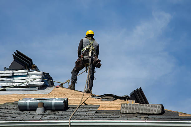 Professional Roofing technician working in Centerport, NY